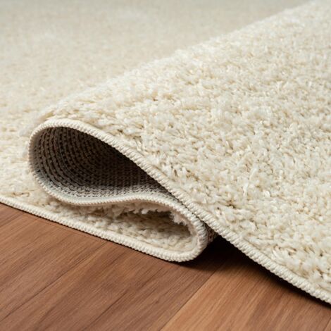 Tapis shaggy 80x150 crème tissé rectangle motif uni UNILA