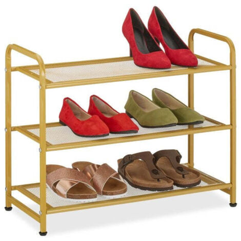 Goldenes schuhregal aus metall (1/5)