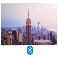 Bluetooth-Einsatz mit Stadtaufdruck im Morgengrauen