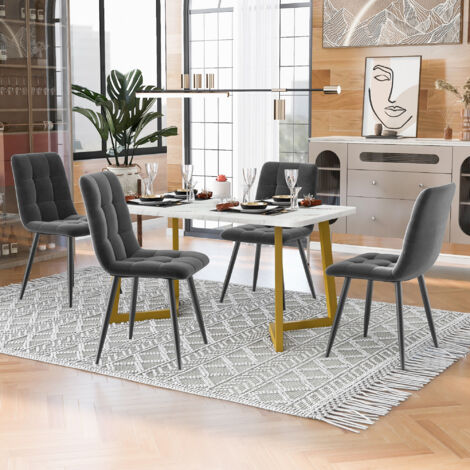 Table de salle à manger avec chaises velours confortables et design