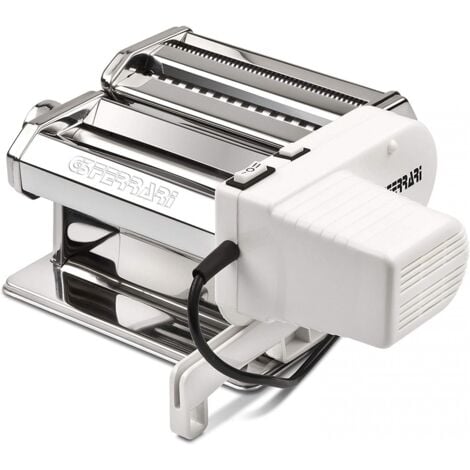Machine à pâtes avec moteur et accessoires.