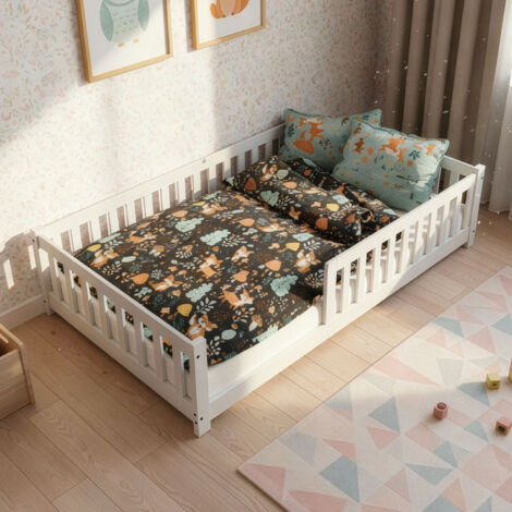 Juskys Lit bébé Naya - Lit avec barrière de sécurité et sommier - Lit en bois pour enfants de 3 à 10 ans - Cadre de lit moderne blanc - 140x200 cm