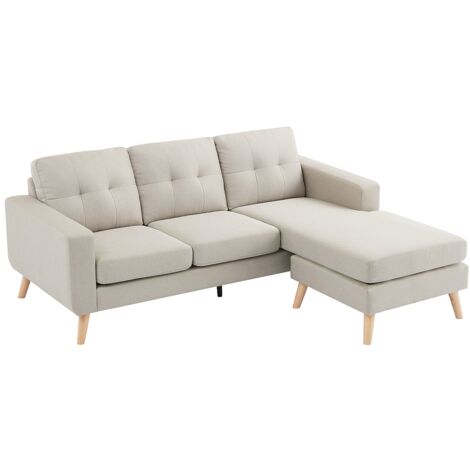 Vente-Unique – Canapé d'angle réversible 4 places en tissu beige – Structure en bois – Garnissage mousse polyuréthane recyclée – Pieds en bois (1/5)