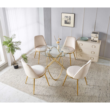 Set da pranzo composto da 5 pezzi: 1 tavolo + 4 sedie in velluto color crema e bianco, con gambe in metallo con finitura dorata.