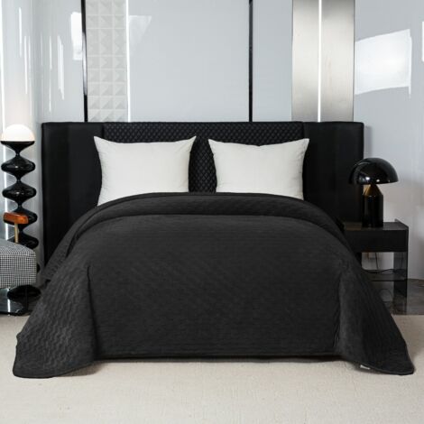 Elegante colcha de 170x210 cm con ribete negro.