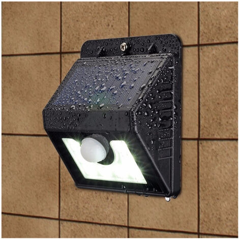 TRADE SHOP - Faro 8 Led Con Pannello Solare Ricaricabile E Sensore Di Movimento Per Esterno -