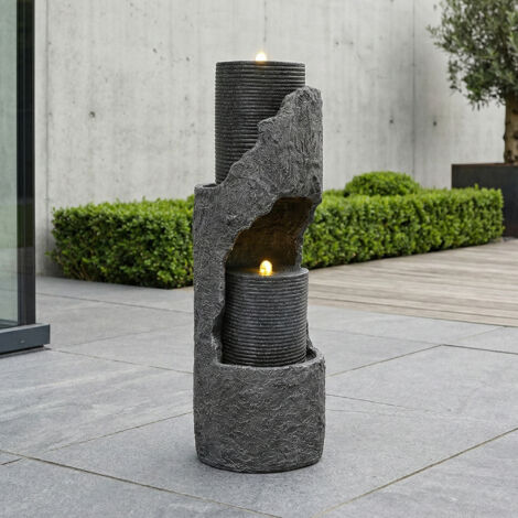 Fuente de jardín con iluminación LED y bomba de agua, aspecto de piedra natural, diseño decorativo, resina gris.