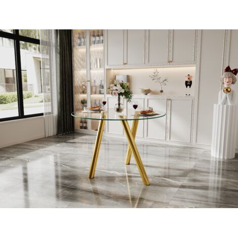 Mesa de comedor redonda de cristal templado con patas de metal dorado, diseño elegante, fácil de limpiar. (1/5)