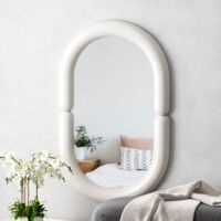 Miroir mural ovale avec cadre blanc épais, style minimaliste élégant pour la décoration intérieure