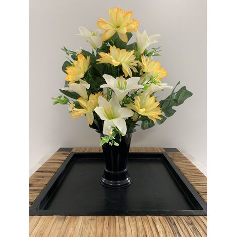 Composition fleurs artificielles réalisée avec des lys et gerberas dans un  cône adaptable pour vase funéraire,