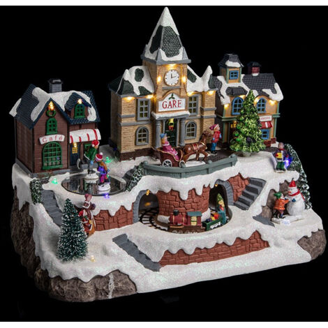 Fééric Lights And Christmas – Village de Noël lumineux animé avec 26 LED multicolores – Gare, maisons, personnages en mouvement – Dimensions 35,5x20,5x27cm – Poids 2kg