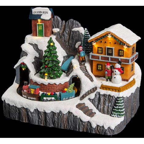 Fééric Lights And Christmas – Déco Noël chalet montagne avec 9 LED blanc chaud – Boîte à musique 3 chansons – Dimensions 23x15,5x17,5 cm – Poids 1,1 kg
