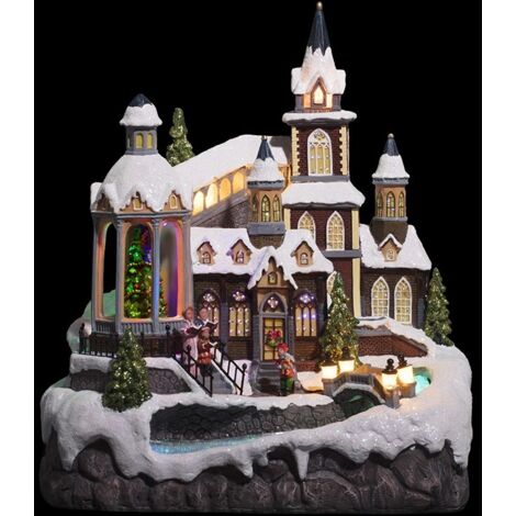 Fééric Lights And Christmas – Village de Noël animé en polyrésine 31x24x39.5cm – 8 LED multicolores – Poids 2.8kg – Fonctionne sur secteur avec transformateur inclus