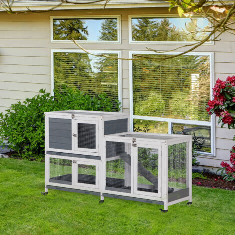 PawHut Conejera de Madera con Ruedas 147x45,5x88,5 cm Jaula para Conejos de 2 Niveles con Techo Abrible 2 Corrales de Metal 3 Bandejas Extraíbles 3 Puertas con Pestillo y Rampa Gris (1/5)