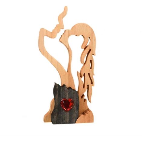 Statuette en bois représentant un couple, idéale pour la décoration intérieure (voir photo). (1/5)