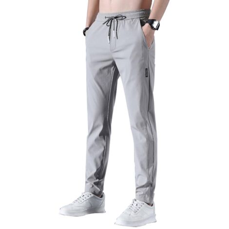Pantalon de sport pour homme à séchage rapide et extensible, respirant et idéal pour la course et le jogging, avec cordon de serrage et poches - Taille L - Gris (1/5)