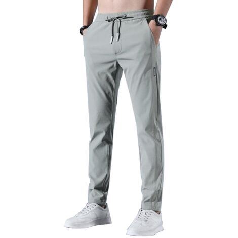 Pantalon de sport pour homme à séchage rapide et extensible, respirant et idéal pour la course et le jogging. Fermeture à cordon et poches. Taille 4XL, vert. (1/5)