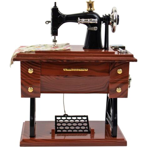Mini máquina de coser musical antigua (1/5)