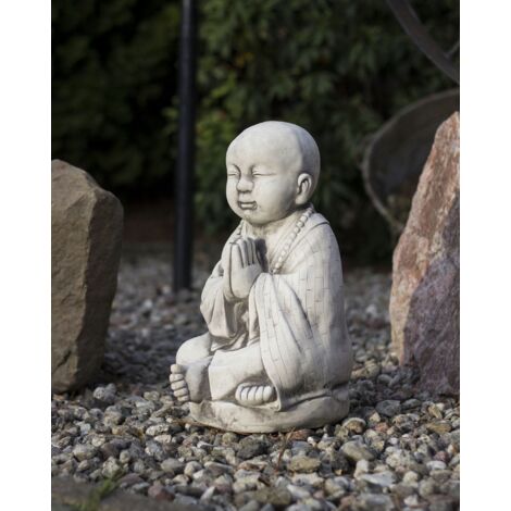 Sculpture de jardin représentant un Bouddha en béton (1/4)