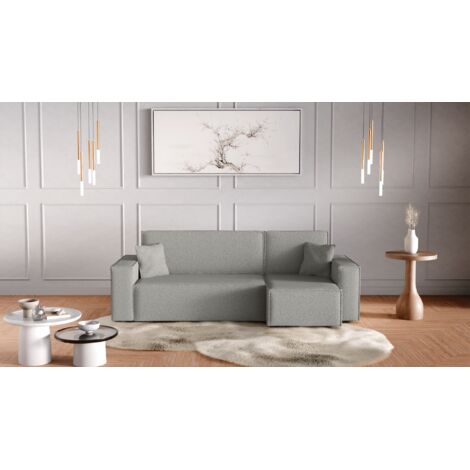 Divano letto angolare reversibile con vano contenitore universale Karl L in tessuto bouclé grigio chiaro del produttore - VINOTTI