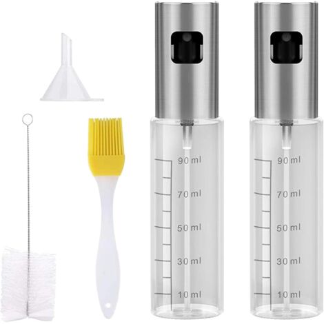 Deux flacons pulvérisateurs en verre avec poignées en acier inoxydable, adaptés à un usage en cuisine. (1/5)