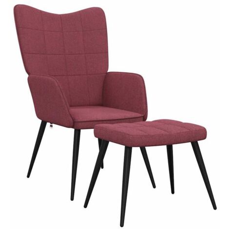 Un fauteuil inclinable avec repose-pieds, en tissu bordeaux.