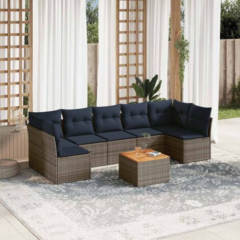 Ensemble de jardin 8 places en résine tressée grise avec coussins bleu marine, table en acacia massif, rangement intégré, design modulaire (1/5)