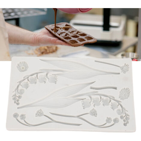 Moule en silicone Muguet en forme de fleur pour décorer gâteaux au chocolat et fondant, idéal pour la pâtisserie et les loisirs créatifs. Moule à fondant pour gâteaux et pâtisseries.