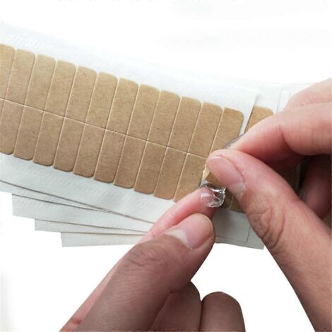 Ruban adhésif double face kaki pour perruque à lace front ultra-résistant. (1/5)