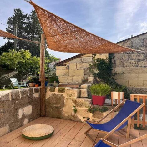 Toile d'ombrage en fibre de coco triangle 4x4x4m (1/5)