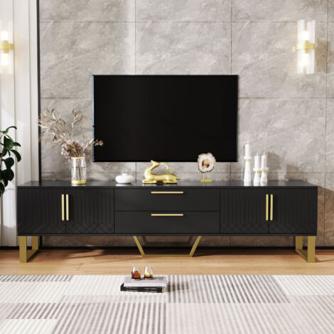 Armoire de télévision à la beauté éclatante : Pieds dorés, poignées et pieds également en or. La porte est ornée d’une texture gravée. Un meuble parfait pour ranger les objets du salon. (1/5)