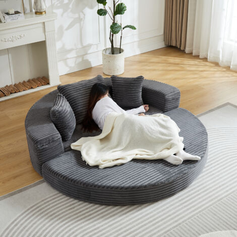 Un canapé convertible très polyvalent, idéal pour les espaces de vie compacte. Il peut être utilisé à la fois comme canapé semi-rond ou comme lit quotidien. Les accoudoirs sont munis de poches en tiss (1/5)