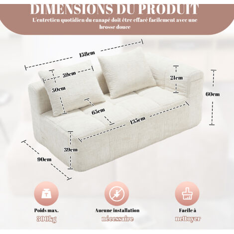 Un canapé confortable pour 2 personnes. Pas besoin de montage particulier. Le canapé est moelleux, avec un coussin. Il dispose également de poches latérales pour ranger la télécommande et le téléphone (1/5)