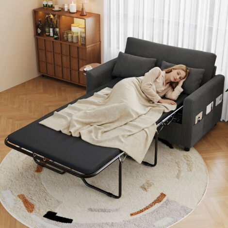 Fauteuil lit convertible pour 2 personnes, avec fonction de couchage. Possède un portail USB pour la recharge des appareils électroniques. Il est également équipé d’un bureau rétractable sur le côté.  (1/5)