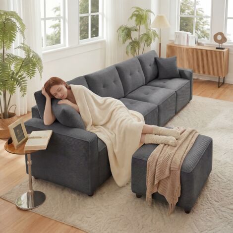 Canapé en velours pour 4 personnes, avec des espaces de rangement sous les assises. Il comprend également un tabouret qui peut être placé librement. Couleur : gris. Dimensions : L. 280 cm × P. 146 cm (1/5)