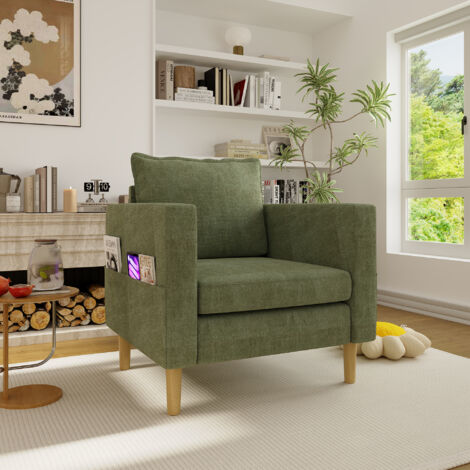 Un fauteuil de loisir à un siège, avec une poche pour ranger des objets et un coussin confortable. Idéal pour les espaces intérieurs au style nordique, ainsi que pour les coins destinés à la lecture. (1/5)