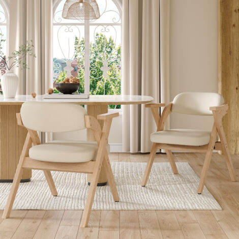 2 chaises à bascule pour la salle à manger. Ces chaises sont faites de bois massif. Elles sont confortables et respirantes. Elles peuvent être pliées ou rangées dans un endroit sec. (1/5)