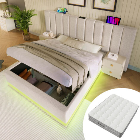 Lit double de 180×200 cm. Lit avec coffre et fonction de charge via LED et USB-C. Structure du lit dotée d’un sommier à pieds en bois. Tissu : lin, couleur beige. Pas de bureau de nuit. (Disponible av (1/5)