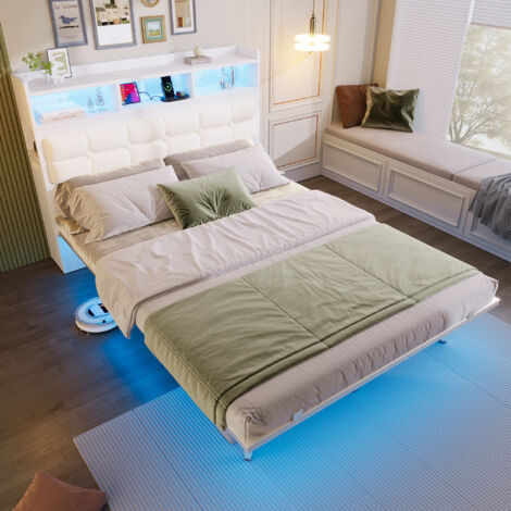 Lit double de 140×190 cm, avec sommier et tête de lit. Il est équipé de 2 petites tables à côté du lit, d’espacements pour ranger des objets, Couleur : blanc. (1/5)