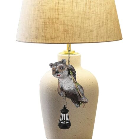 Décoration solaire en résine d'animal de patio – Figurine de raton laveur (1/5)