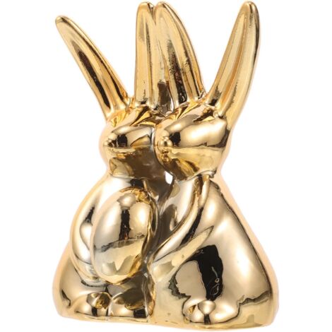 de lapin en c ramique dor e serrant un uf objet d coratif (1/5)