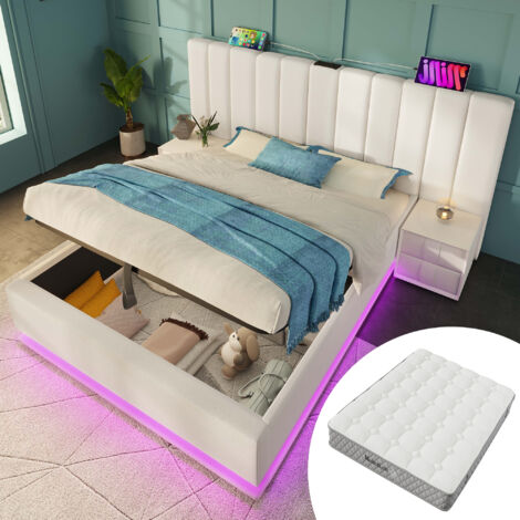 Lit double de 180×200 cm. Lit avec meuble de rangement. Éclairage LED et fonction de charge via USB-C. Structure du lit constituée de lattes en PU. Couleur blanche. Pas de bureau à côté du lit. (Avec (1/5)
