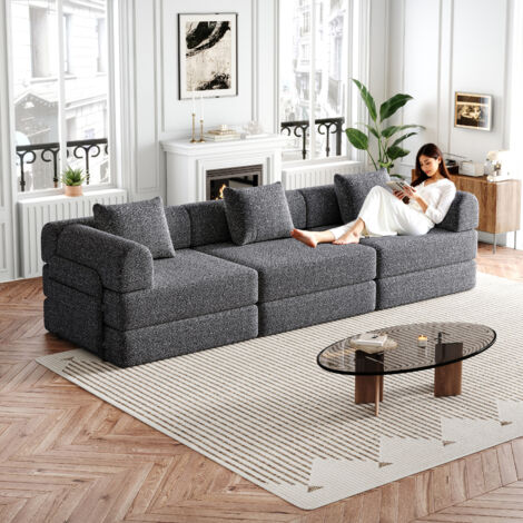 Fauteuil en tissu confortable, compressible, avec un tabouret. Parfait pour les salons et les appartements étudiants. (1/5)