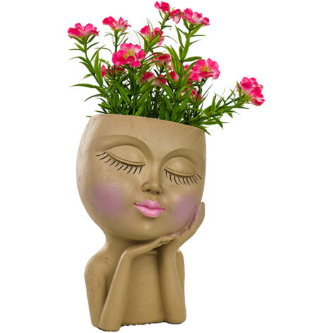 Mannequin en résine, joue reposant sur un pot de fleurs, visage - Mannequin en résine, joue reposant sur un pot de fleurs, visage