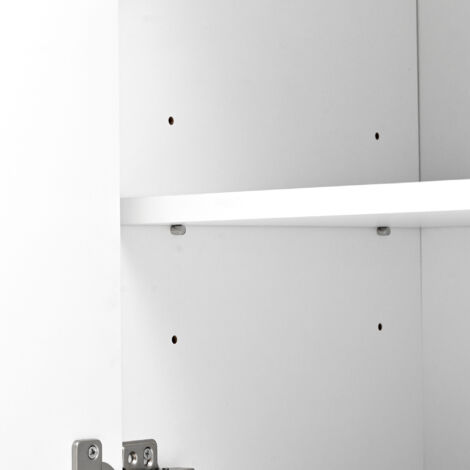 Compartiment de rangement avec des poignées et des pieds en métal doré. Il comporte 4 portes et 4 tiroirs. Le plancher est constitué de panneaux en laminat qui peuvent être retirés (1/5)