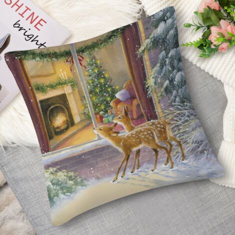 Housse de coussin renne au milieu de la neige (1/5)