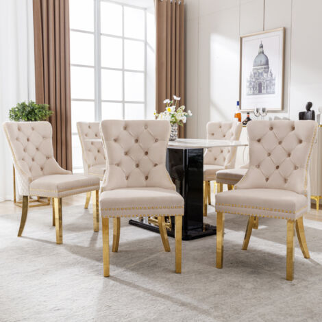 Fauteuil pour la salle à manger (fauteuil de cuisine). Ce fauteuil possède un mécanisme unique pour frapper à la porte. Le fauteuil est également doté de pieds réglables, en acier inoxydable doré. (1/5)