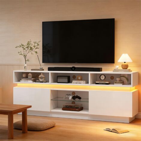 Stoilette de télévision de 1603560 cm, conçue pour être installée dans le salon. Elle possède un support plat pour la télévision, avec un espace de rangement en verre durci.Couleur blanche. (1/5)