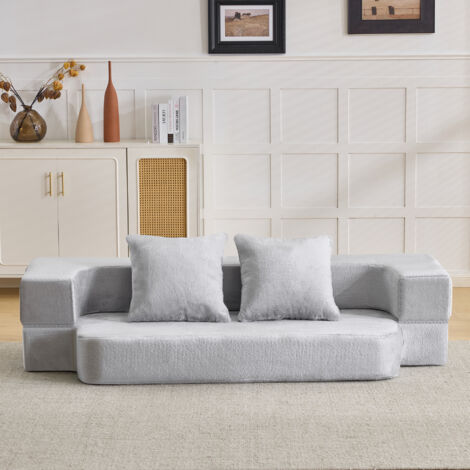 Grand canapé noir moderne, équipé de 4 coussins. Pas besoin de montage particulier. Design sophistiqué. (1/5)