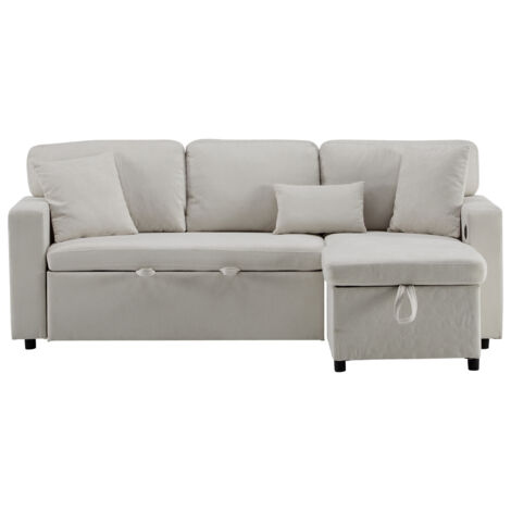 Canapé coin, lit de forme carrée, lit convertible. Il comprend également un coffre à sous et un meuble d’intérieur. Couleur beige. (1/5)